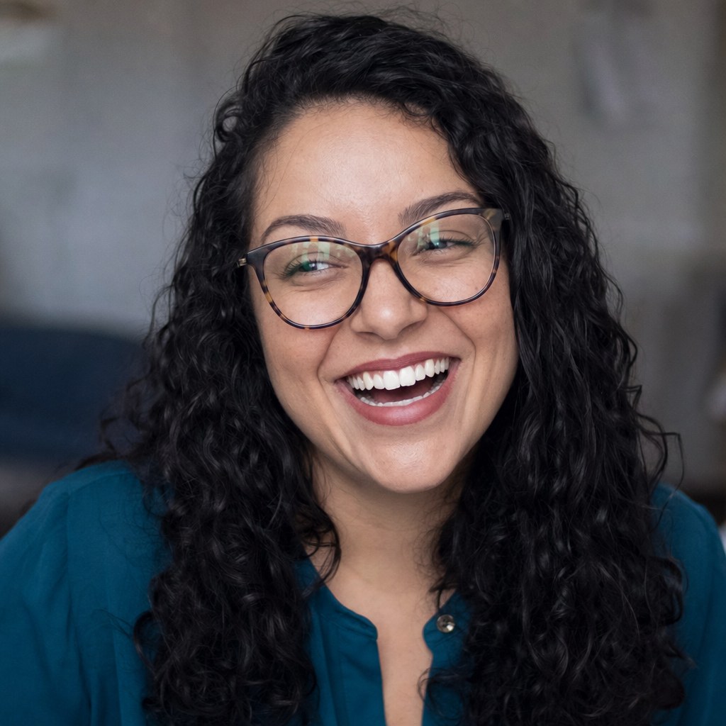 Laughing professional in glasses