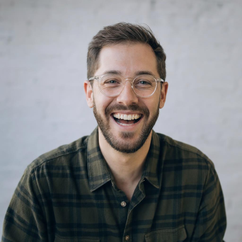 Laughing professional in glasses